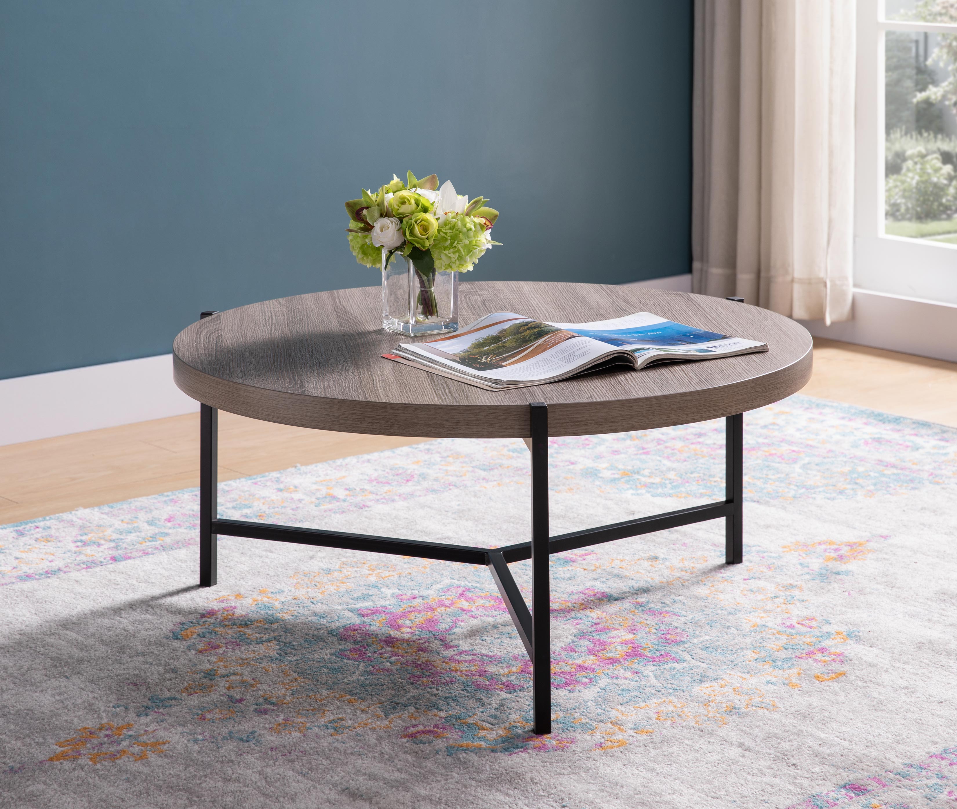 Ravina modern round coffee table in grey wood look