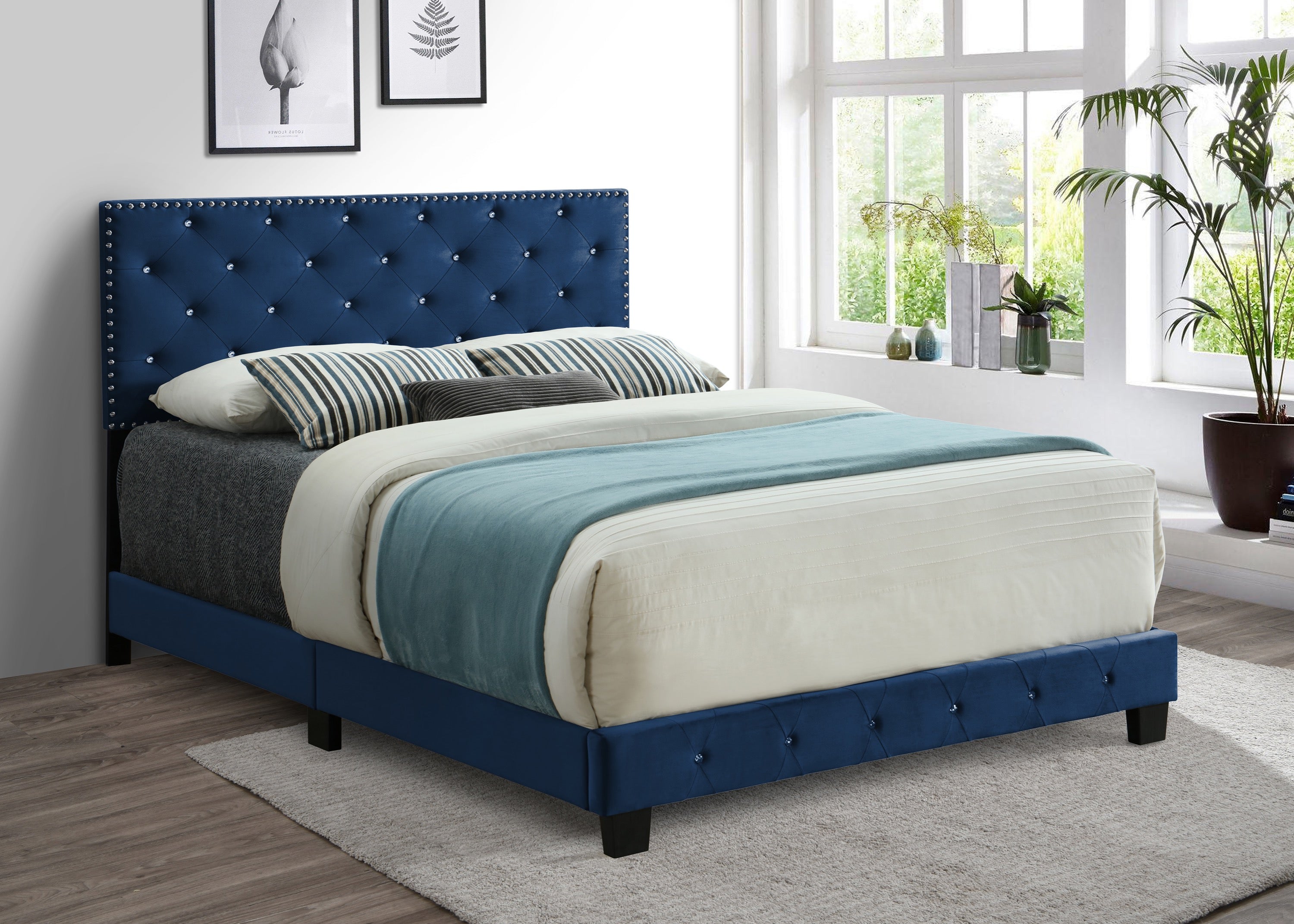 Briarhill blue velvet adjustable bed with nailhead trim
