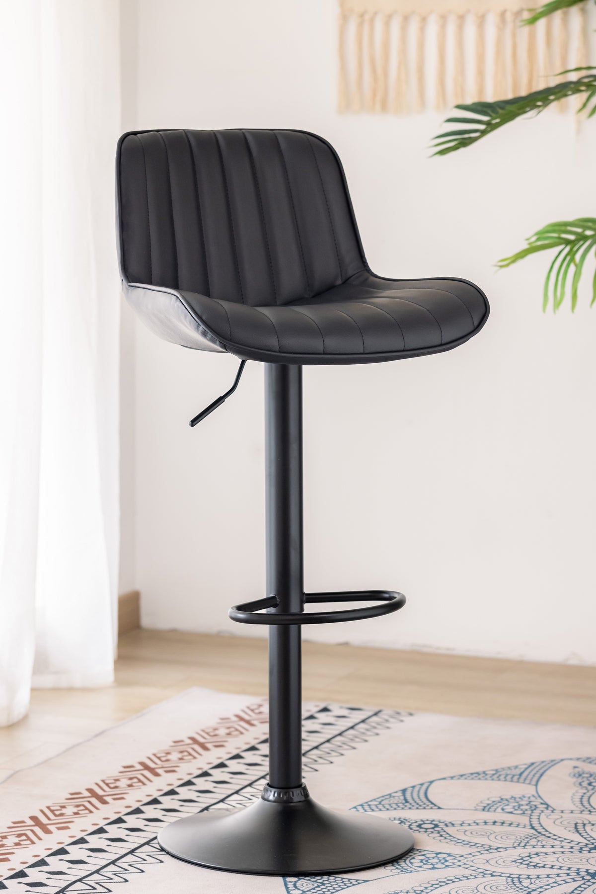 Polson swivel bar stool with vertical stitching