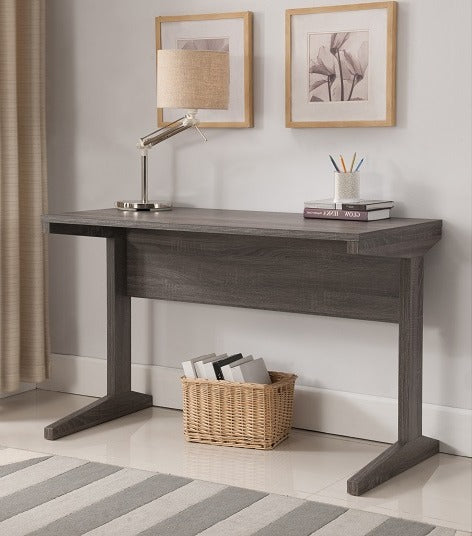 Grey L-shaped leg computer desk for a home office
