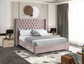 Selby dusty pink velvet wing bed with chrome nailheads