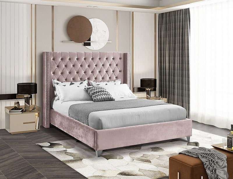 Selby dusty pink velvet wing bed with chrome nailheads