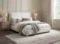 Tyndall ivory fabric bed with wood base