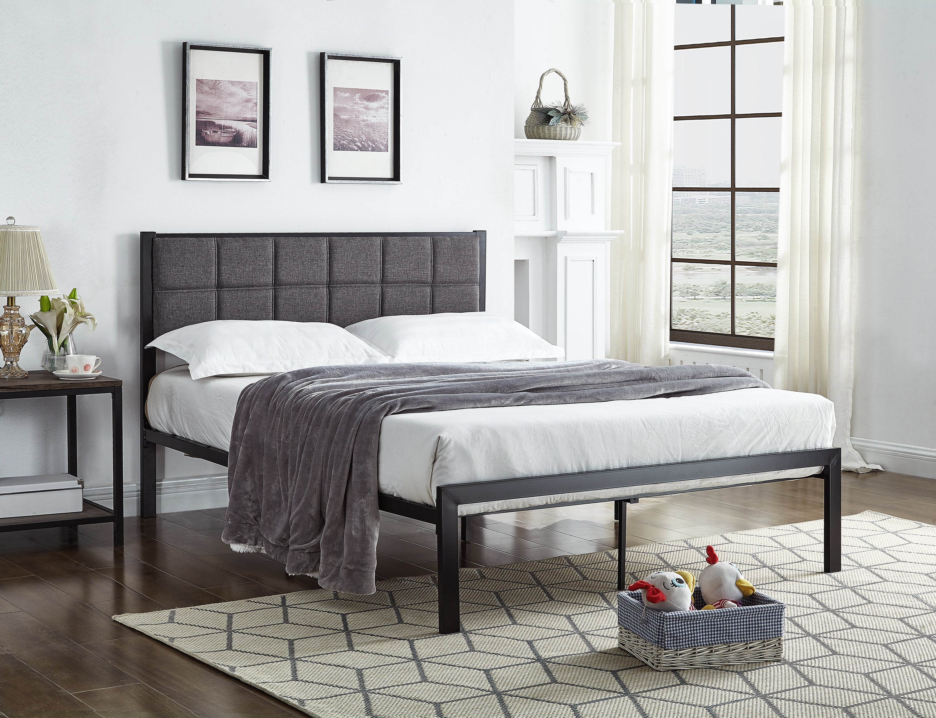 Halton black metal bed frame with padded grey fabric headboard