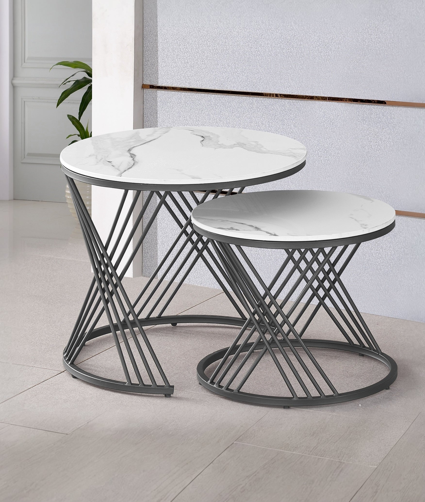 Cliffside set of two round white marble-look coffee tables