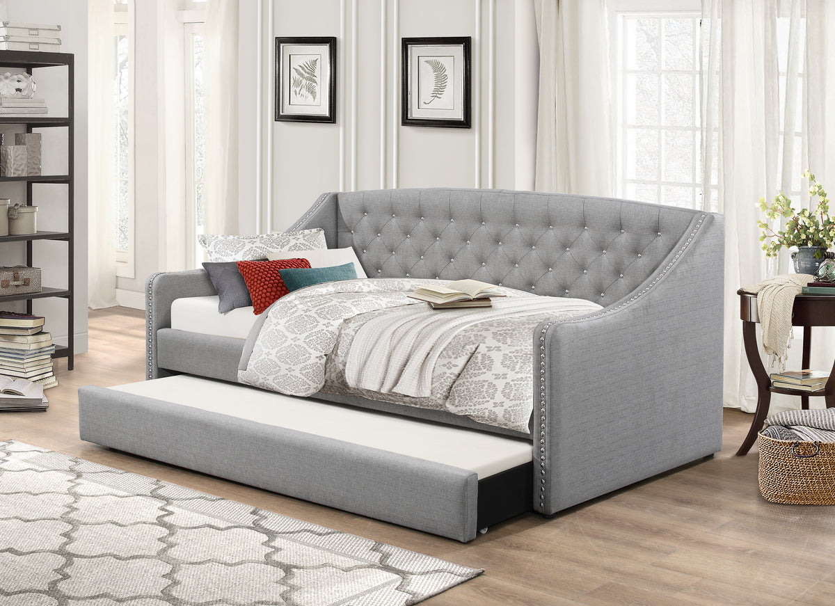 Chaplin grey day bed with nailhead trim and trundle