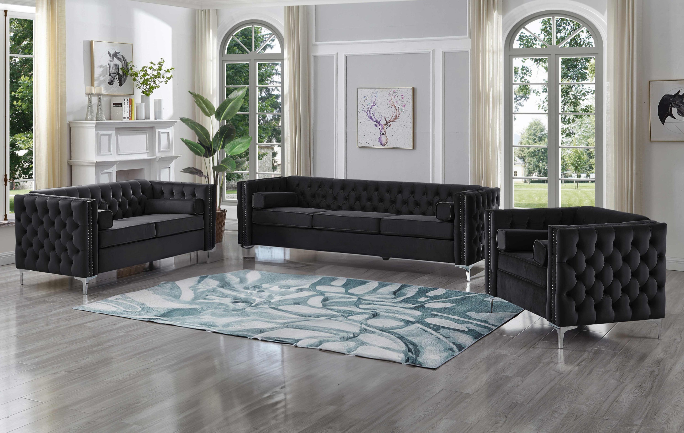 Havenbrook black velvet sofa set with deep tufting and nailhead detail