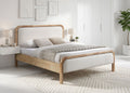 Curzon ivory fabric bed with curved wood frame