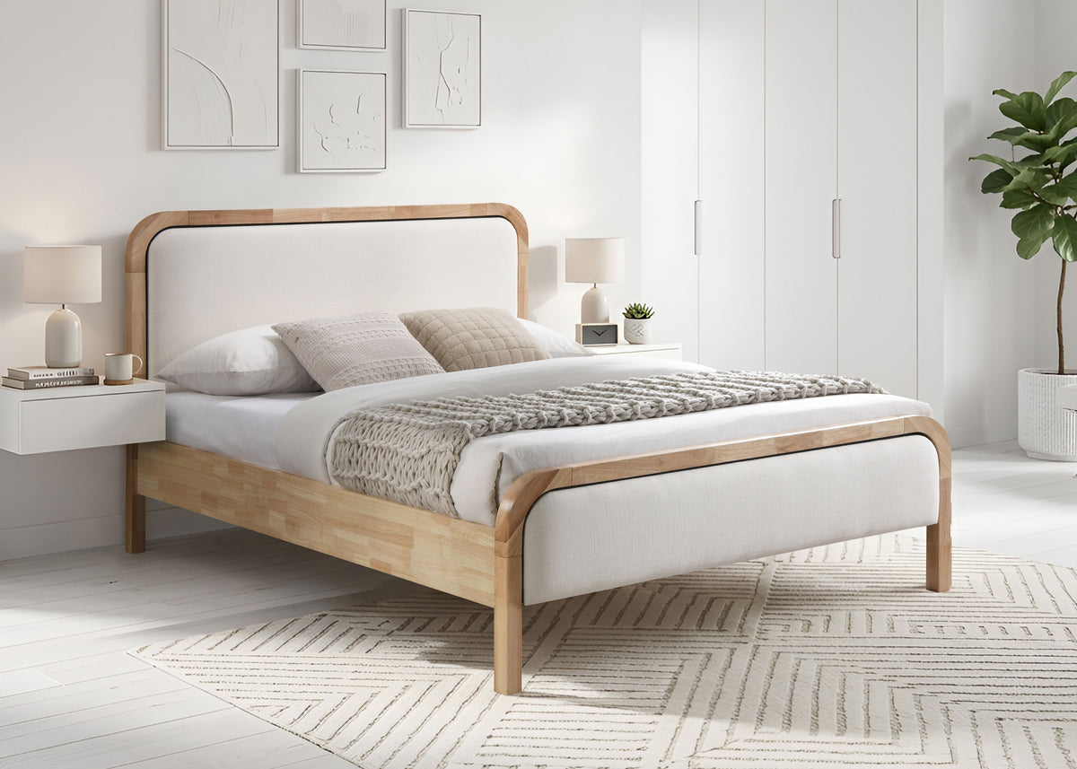 Curzon ivory fabric bed with curved wood frame